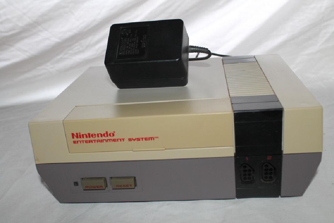 Original NES console: Tested, working. Only comes with power supply.