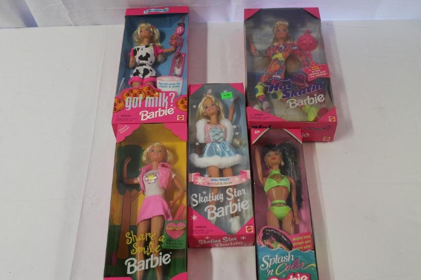 Lot of brand new-old-stock Barbie Dolls: Hot Skatin' Barbie, Skating Star Barbie, Share a Smile Barbie, Got Milk Barbie, and Splash of color Kira.