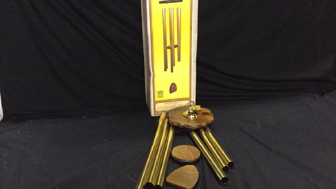 Molenaar gold colored windchimes.: Molenaar gold color exotic wind chime. 7 3/4" x 7 3/4" x 26 3/4". Relaxing day-dream like sound with exceptionally clear tones. Used