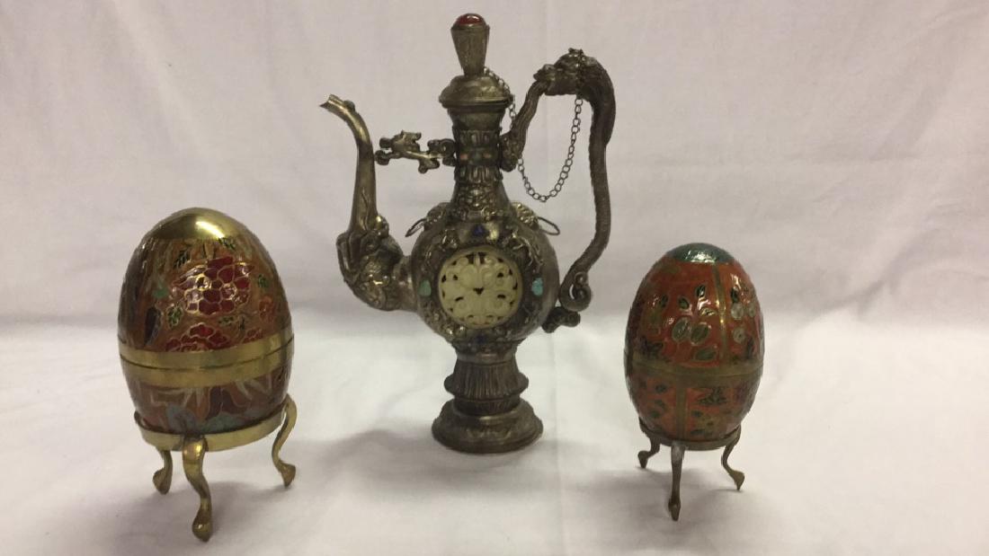 Vintage decorative teapot and 2 brass eggs: Vintage decorative teapot and 2 brass eggs.. 13" tall teapot with semi precious stone inlays and Detailed lion/snake handle and elephant spout. Enamel paint on brass eggs that open up. 6 1/2" and 5 1/