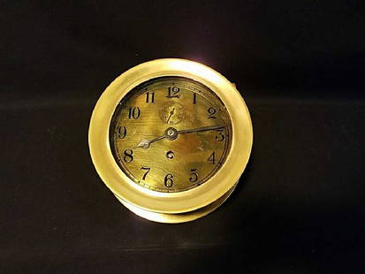 Brass Ships Clock: Brass Ships Clock. Operational. Max exterior dimensions 7.25"dia. 3.5"deep. Est. 7lbs. 3