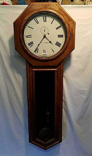 Seth Thomas. Regulator Number 18.: Seth Thomas. Regulator Number 18. 54"tall Key, weight, and pendulum included. dial measures 14 inches in diameter. This clock was made circa 1900.