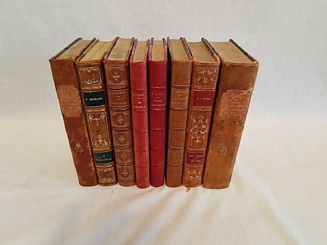 Vintage French leather bound books 1893-1926: Vintage French leather bound books 1893-1926 set of 8. Most have been signed by the gift giver with the date. 7.25" x 5".