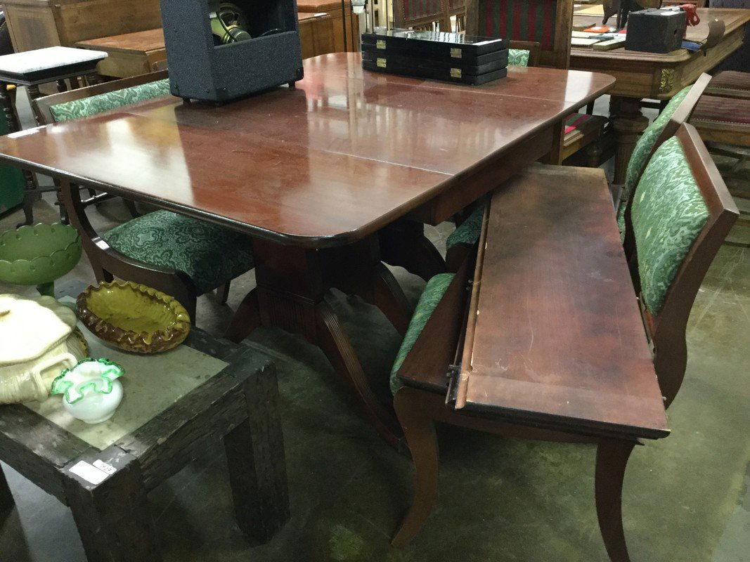 Duncan Phyfe Drop Leaf table with five chairs.: Duncan Phyfe table with five chairs. 54" long with leaves open 24" closed, 42" wide. Mahogany with triple pedestal.