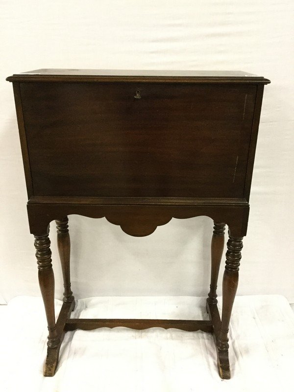 Mahogany drop front cabinet: Mahogany drop front cabinet. 30"x 121/2"x43". 1920's-30's . No drawers or shelves inside.