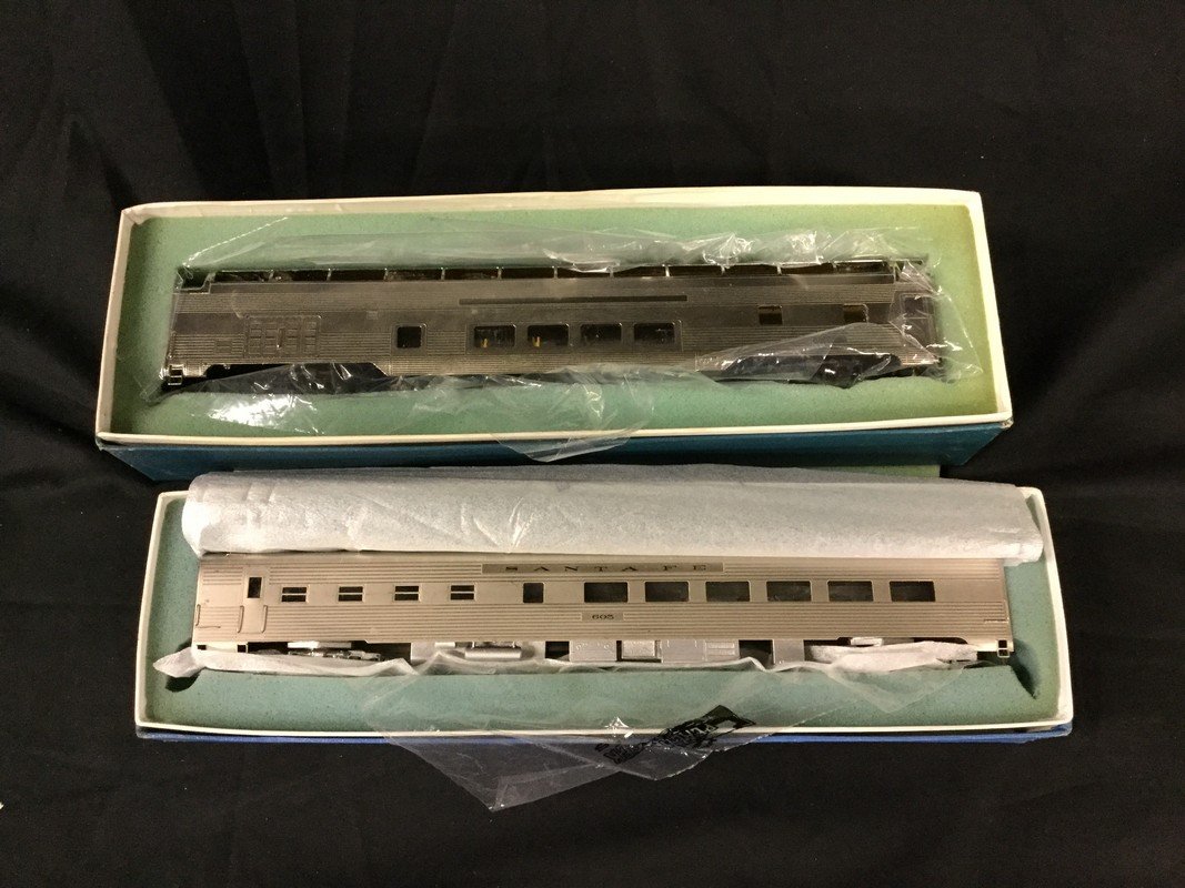 Three Lambert associates metal coaches: Three Lambert associates metal coaches; two full dome coaches and diner car. Open boxes new condition