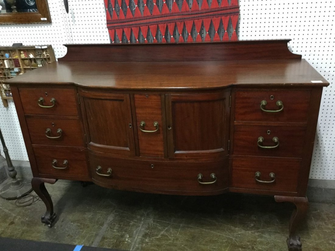 Buffet: mahogany buffet with brass handles and claw feet