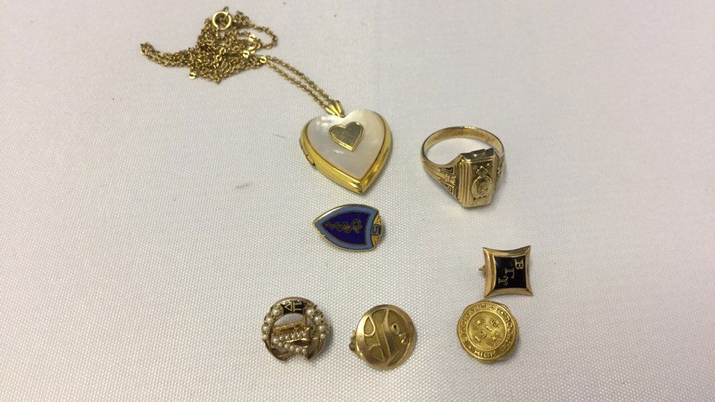 Lot of Gold Pins, necklace, and ring. (1 of 4)
