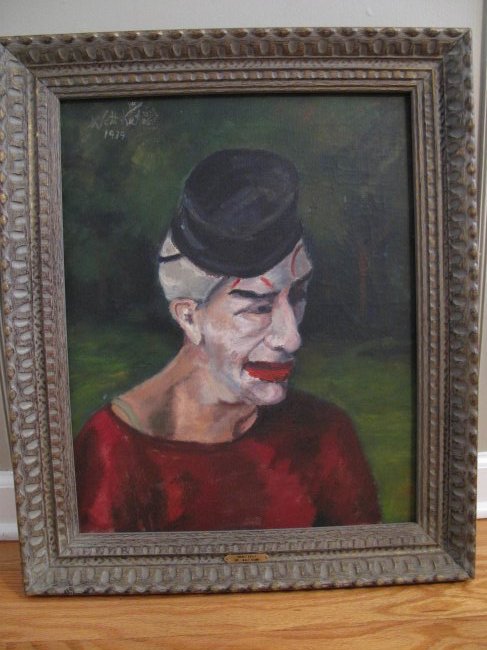 OIL ON CANVAS PORTRAIT OF A CLOWN In Manner of W. KUHN: An original oil painting on canvas of a clown wearing a black beaver hat. Notations verso and on plaque suggesting subject is Emmet Kelly -- a famous clown/aka the sad faced hobo. Signature and plaque