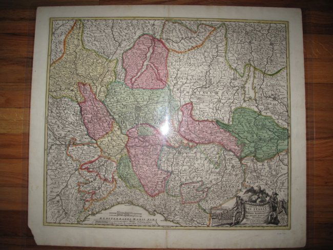 1702 HOMANN MAP ITALY "BELLI TYPUS IN ITALIA": A beautifully engraved and colored original 18th Century map of Italy. This piece is entitled: "Belli Typus in Italia" Engraved by John Baptist Homann in 1702. It is richly hand colored and visually s