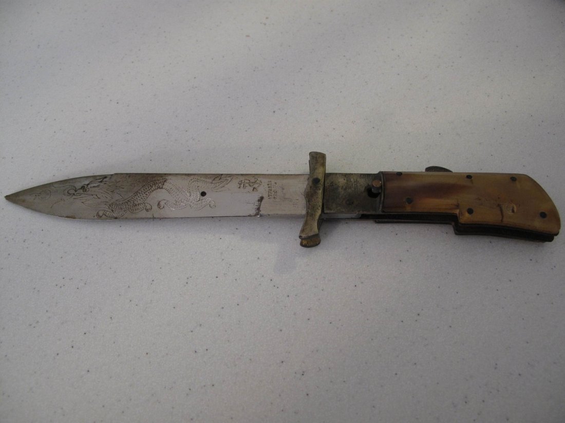 GERMAN SAILOR TRENCH ART KNIFE Engraved Dragon Design: A nice example of a vintage German sailor trench art knife. This blade of this folding knife is engraved/etched with a fire-breathing dragon on both sides. One side also features a rope and anchor ins