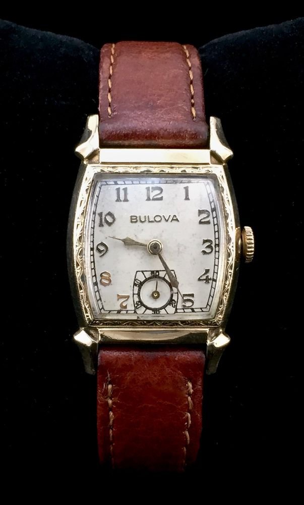 Vintage Men's Watch, Bulova Cadet, Art Deco, 15 Jewels,: This is a wind up mechanical movement watch. Dial is marked Bulova Swiss. Movement: 10AX Movement 15 Jewels 1942; great condition. 27 mm wide x 38 mm lug to lug. Leather stitched band.