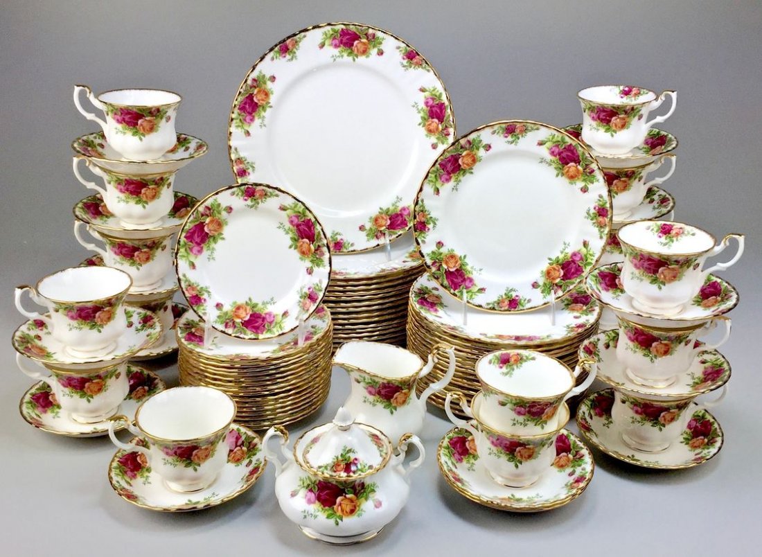 Royal Albert Bone China England Country Rose 5-piece,: The ever popular and very elegant Country Rose Pattern from Royal Albert. Beautiful rose pattern with gold rim. Dinner plates measure 10 inches in diam. 16 each of cup & saucer, dinner plates, dessert