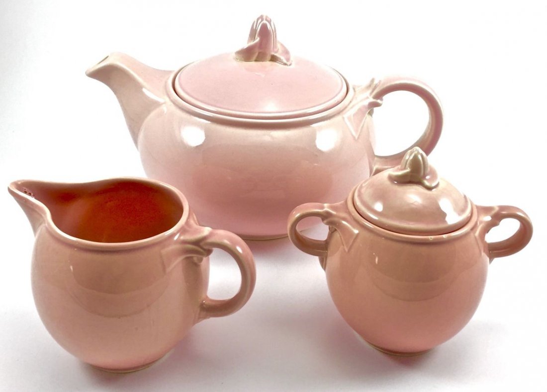 Taylor Smith Lu-Ray Pastels Tea Set (Pink): TS&T LuRay Pastels tea pot with lid pink curved spout, lidded sugar bowl and creamer. Mid-century origins and in great condition! Tea pot is 5.5 inches tall, 9 inches wide.