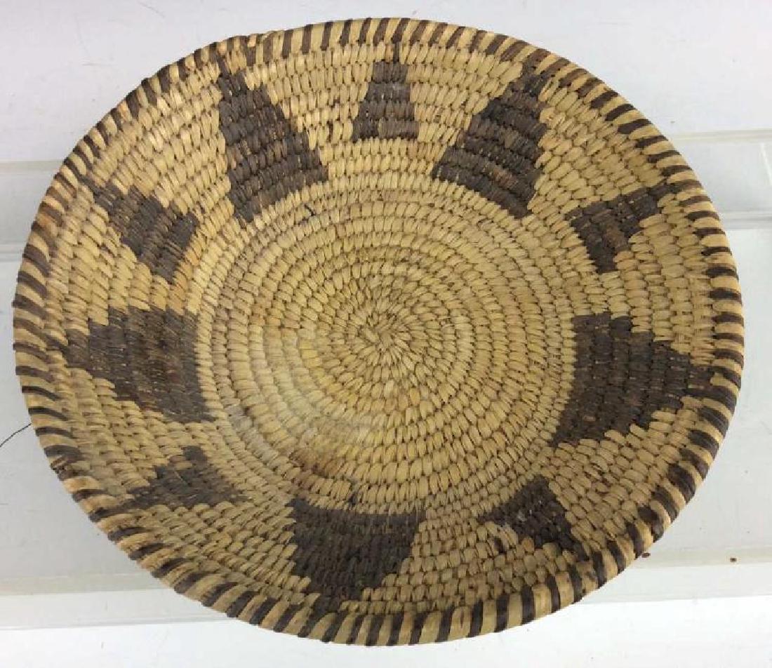 Antique Native American Papago Hand Made Basket: Here nice antique Native American Papago Hand Made Basket. It measures 2 1/2 inches tall X 10 inches wide. Overall the material and weave is in nice condition. It shows signs of age and wear in colori