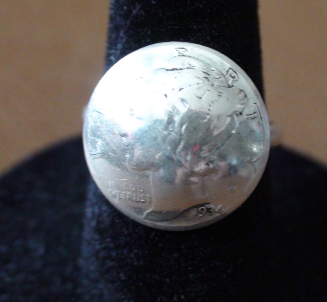 Antique Mercury Dime Silver Ring Size 6: Here is an antique pounded Mercury Dime Ring. The ring is most likely Native American Navajo. It is a size 6. It is in great condition for the age and is ready to wear. Please email any questions.