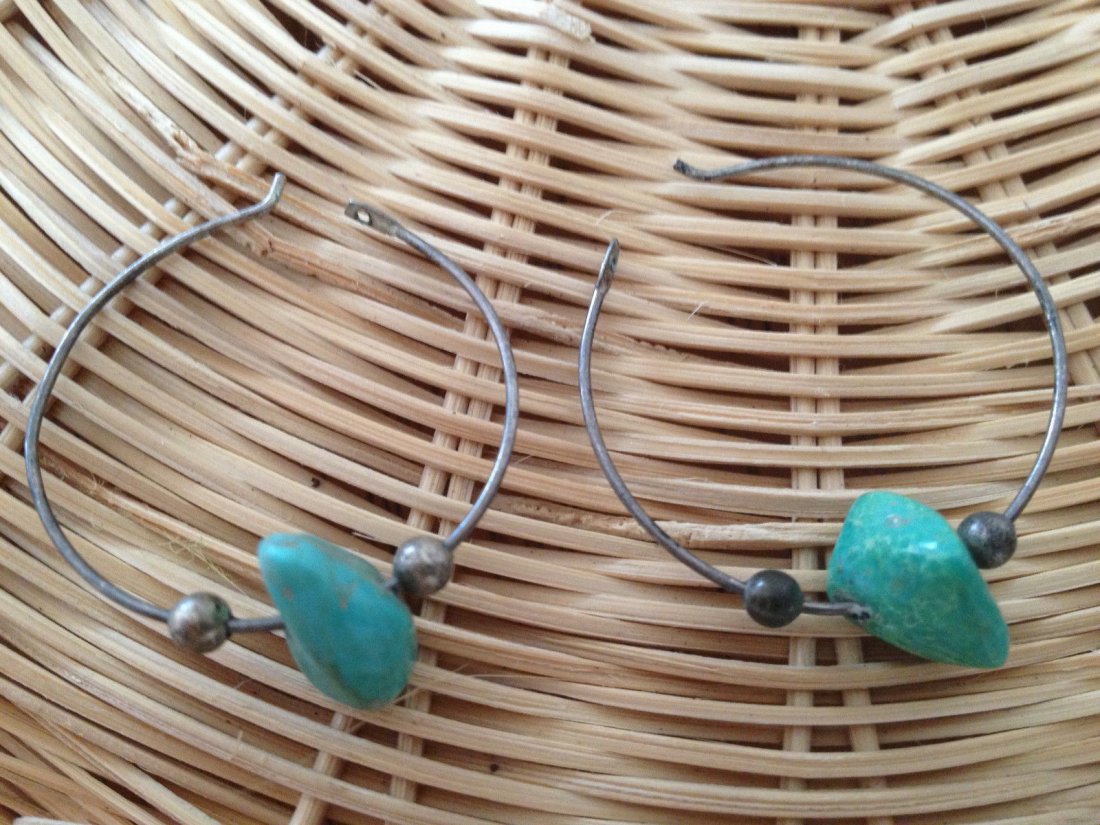 Native American Navajo Sterling Turquoise Earrings: Here is a nice Old Pair of Handmade Native American Navajo Silver and Blue Turquoise Stone Hoop Earrings. They are in nice overall condition with a silver patina. The hoops measure 1 inch across. Plea