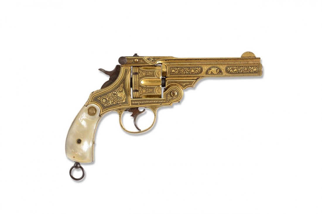 An important revolver and rare historic object: In 10,35 calibre produced by the firm "E. TETTONI - Fabbrica Armi - BRESCIA" written on the rib, derived from the American Smith & Wesson model, weapons produced the the Italian army by the Spanish fi