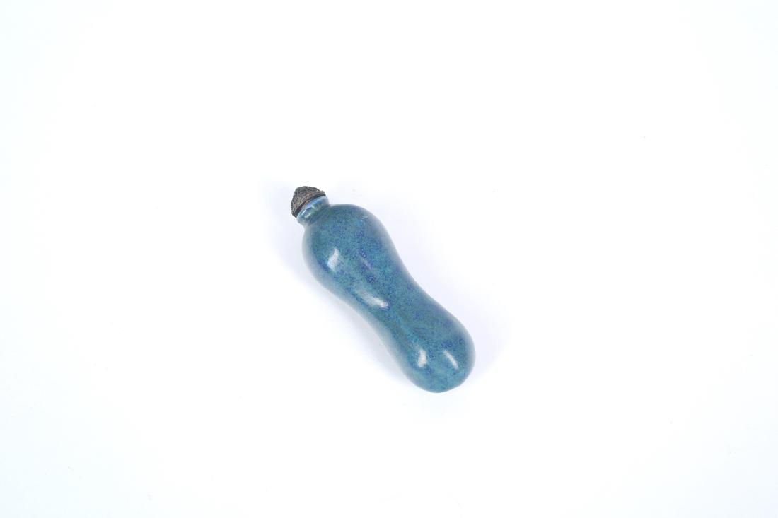 A Chinese Blue Glazed Porcelain Snuff Bottle (1 of 4)
