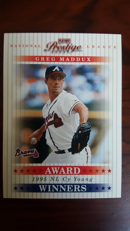2003 Playoff Prestige Award Winners #9 Greg Maddux: Numbered 1485 of 1995