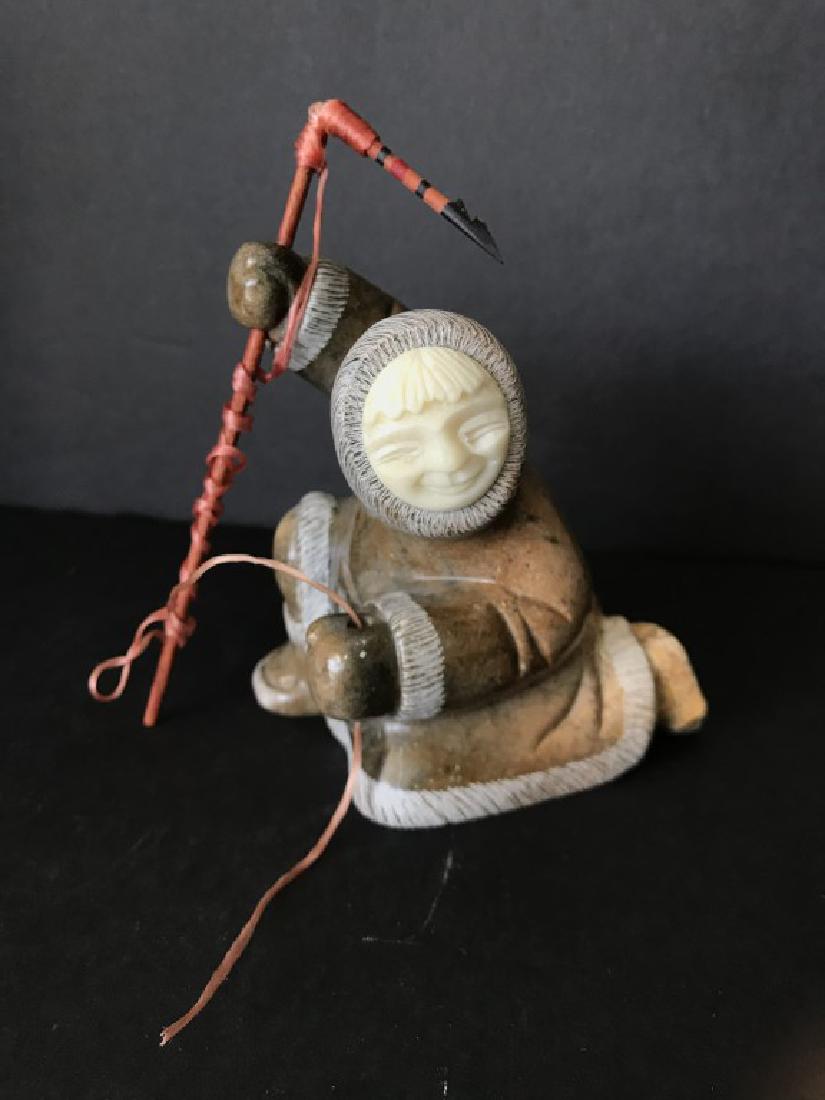 Antique Stone Whale Hunter: Antique inuit whale hunter made of stone, whale bone face, little broken piece in one foot, measures(3.5''x3''x3.75'')