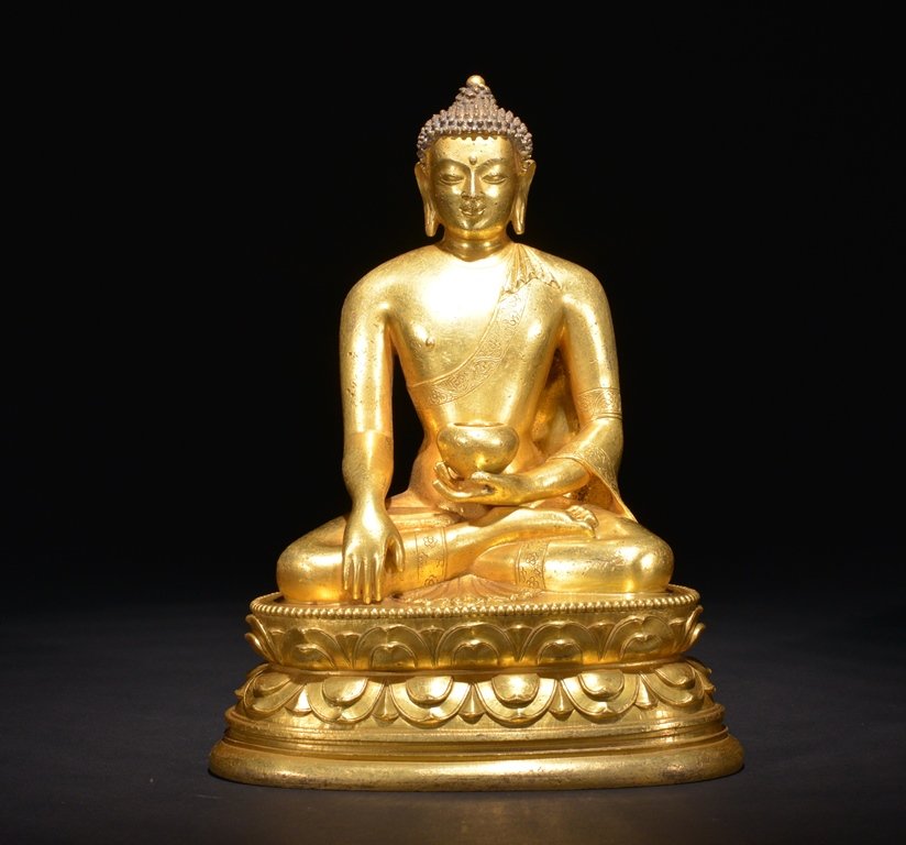 A MONGOLIA GILT-BRONZE FIGURE OF BUDDHA OF MEDICINE (1 of 8)