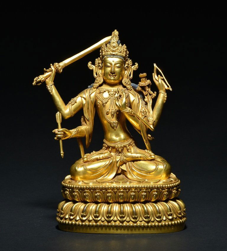 A GILT-BRONZE FIGURE OF MANJUSHRI (1 of 9)