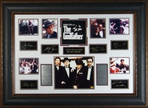 The Godfather Unsigned 27X39 Photo Engraved Signature: The Godfather custom premium framed unautographed Signature Engraved oversize 27x39 piece. FEATURING THE ENGRAVED SIGNATURES OF AL PACINO, MARLON BRANDO, TALIA SHIRE, JAMES CAAN, ROBERT DUVALL, AND DI