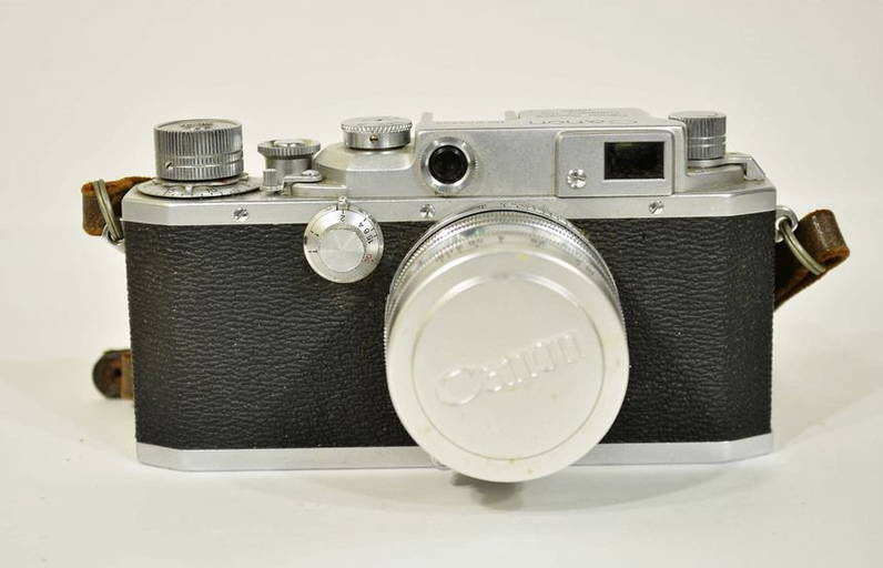 Vintage Canon Camera With Lens