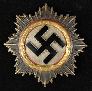 War Order of The German Cross in Gold: A German made example having four rivets to the reverse and with a broad vertical pin and catch. Maker marked 1" on the pin with some scratch marks below. The obverse retains all of the original finis