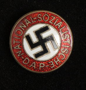 A Group of Four Badges and a Stick-Pin.: Comprising of a Nazi Party Badge, Hitler Youth Badge, 1936 Olympic Games Berlin Commemorative Badge, an SA/SS Cap Skull and a Miniature Award Stick-Pin. All the badges retain their pins and catches an