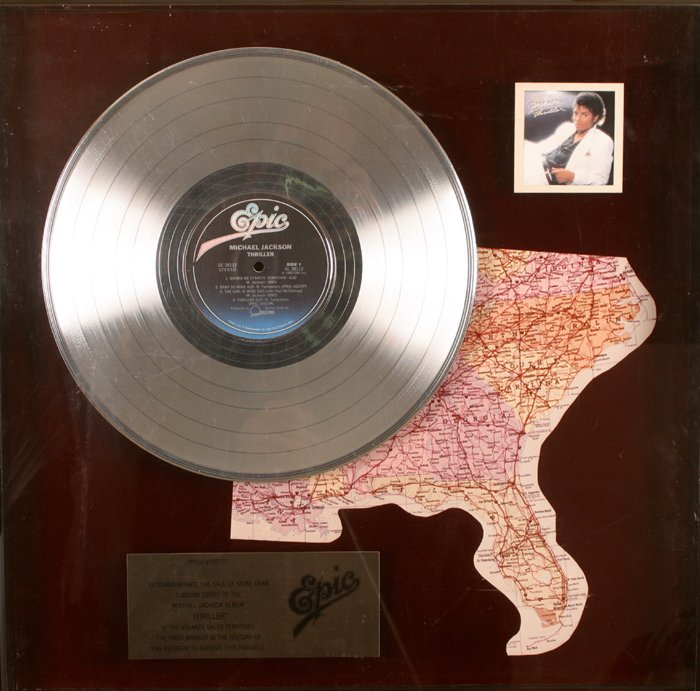 Michael Jackson, Thriller" Epic Records sales award": An Epic Records sales award presented to the Tom Chaltas to commemorate the sales of more than 1,000,000 copies of the Michael Jackson album Thriller" in The Atlanta Sales Territory, the first branch 