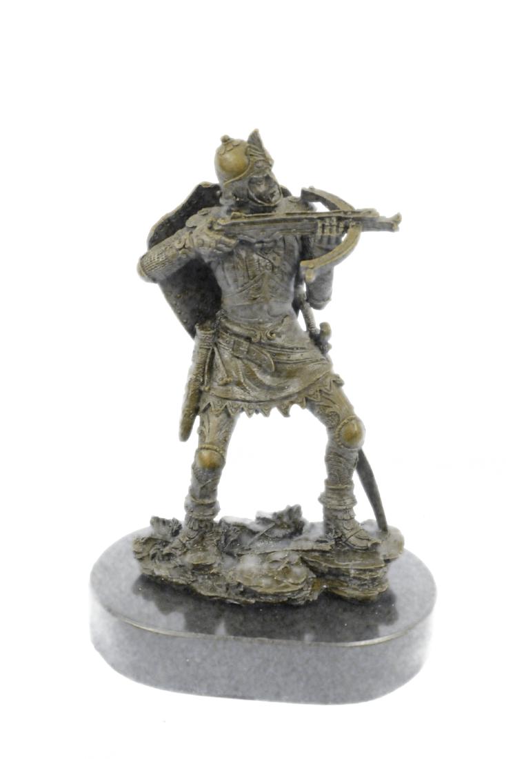 Japanese Warrior Bronze Sculptur: This Ancient Warrior Creeps Up The Muddy Hill, Stalking His Enemy. Though He Wears Boots, His Moves Are Stealth. He Holds Up A Crossbow And Lines His Target. His Brow Furrows Intensely With Killer Foc