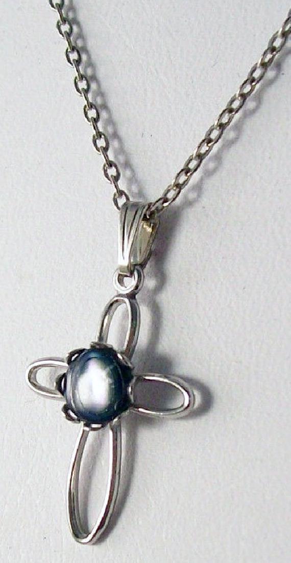 Silver Tone Cross Pendant Necklace: Silver Tone Cross Necklace with Stone Center. Size: 17