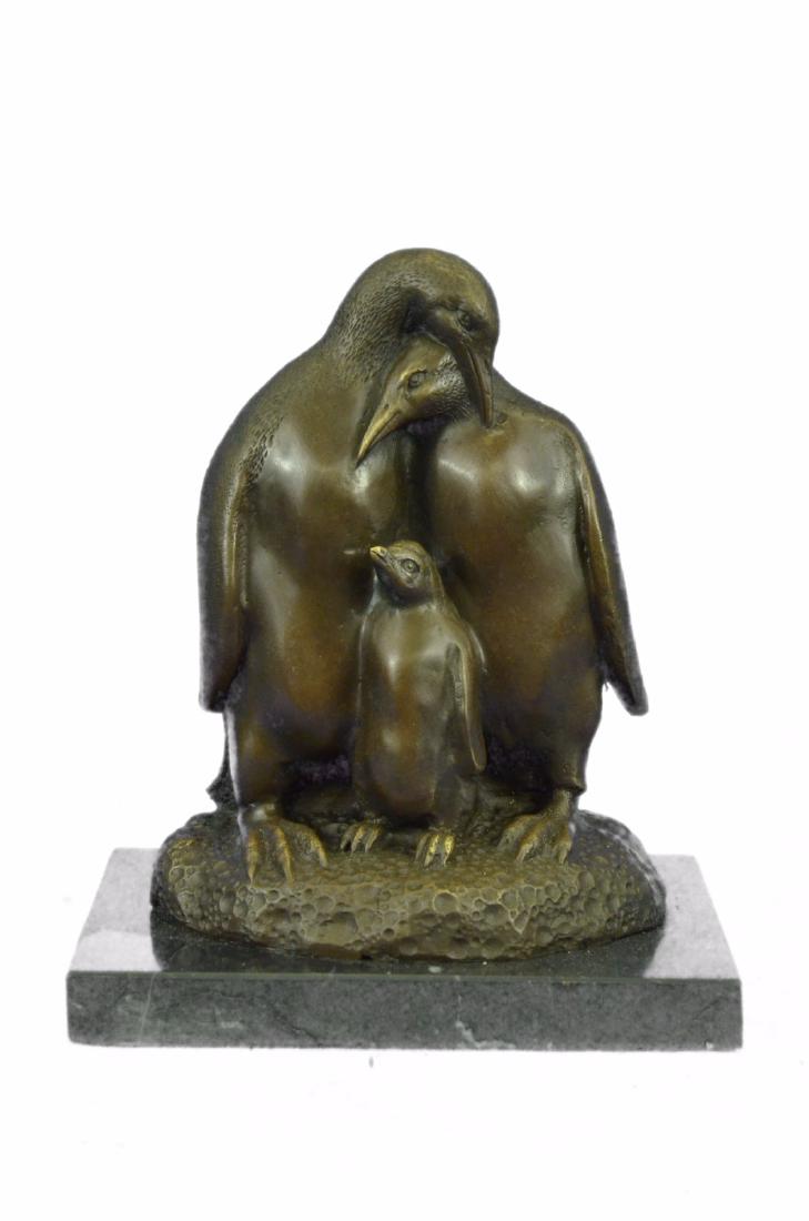 Emperor penguin and family bronze sculpture on Marble (1 of 10)