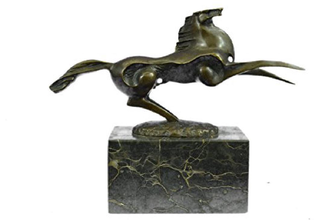 Modern Art Horse Stallion Bronze Sculpture: This Abstract And Modern Horse Gallops Into The Wind And Rears Up Letting Out A Wild Neigh As The Wind Seems Pushing Against Him With A Mighty Force. This Abstract Horse Captures Emotions From The Art