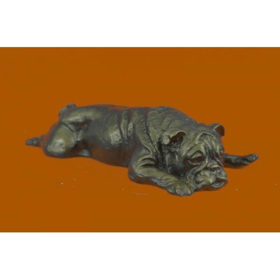 Adorable Sweet Little Bulldog Bronze Sculpture: This adorable bronze sculpture shows the sweetest little bulldog lying on his belly sprawled out on the marble. With the cutest and very lifelike facial features this bronze is sure to add a touch of