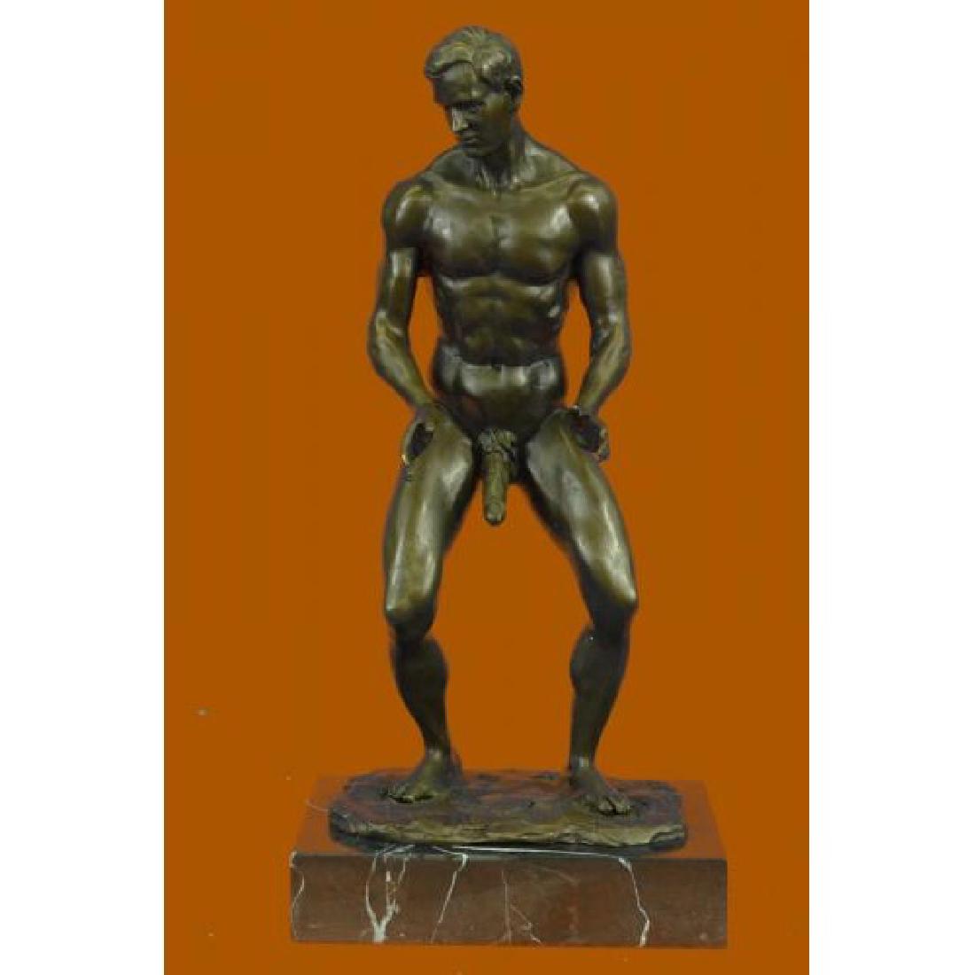 Limited Edition Collector Edition Love you This Much by: He boldly stands in the buff with a look of fearless determination.This proud gay man stretches his muscular arms in front of him and poses for his admirers. Proving he knows no shame he showcases how
