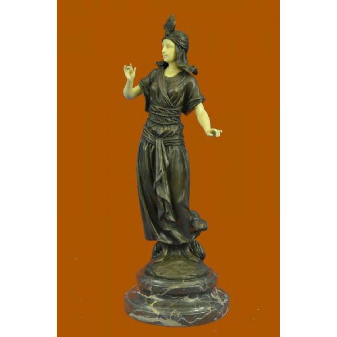 Art Deco Bronze and Faux Bone Turkish Princess: Ease And Fierce Composure Emanate From This Art Deco Sculpture. It'S A Wonderfully Designed And Executed Work Of Art, From The Delicately Poised Stance Of The Woman In A Gesture Very Reminiscent Of po