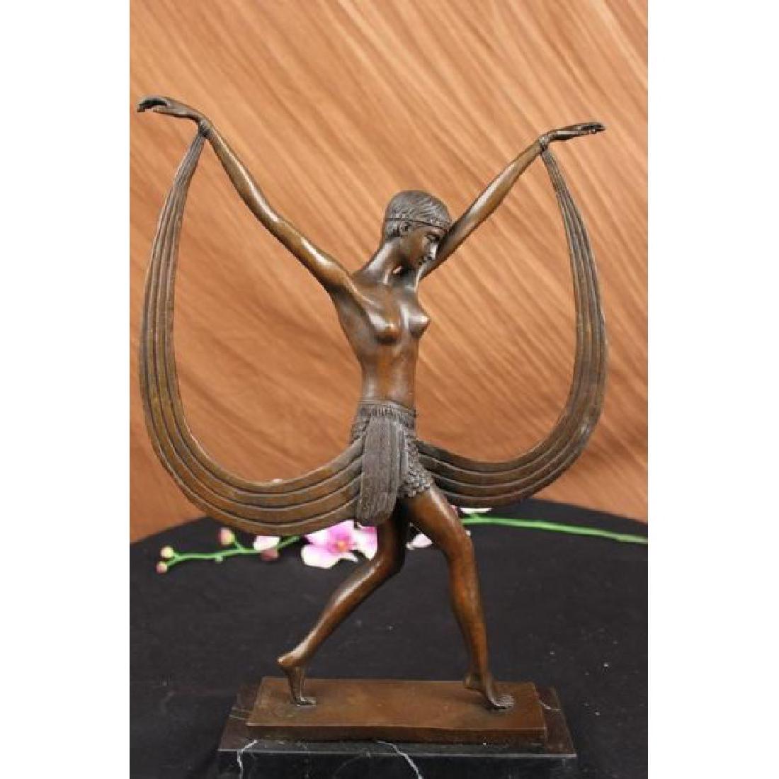 Art Deco ~C. Mirval~Ribbon Dancer Bronze Figurine: The belly dancer is light on her feet and fluid with her waistline. She stretches her arms out to her sides as she glides across the floor on the balls of her feet. A long sash is attached to her wris