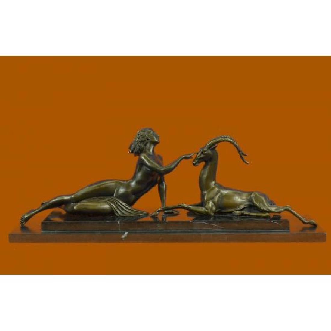 Art Deco Nude Female with Goat Bronze Sculpture Lost: Bronze nude petting a goat. This exquisite sculpture depicts a naked woman petting a goat head. This statue has been created in the style of Vitaleh, the famous Italian artist and signed Aldo Vitaleh.