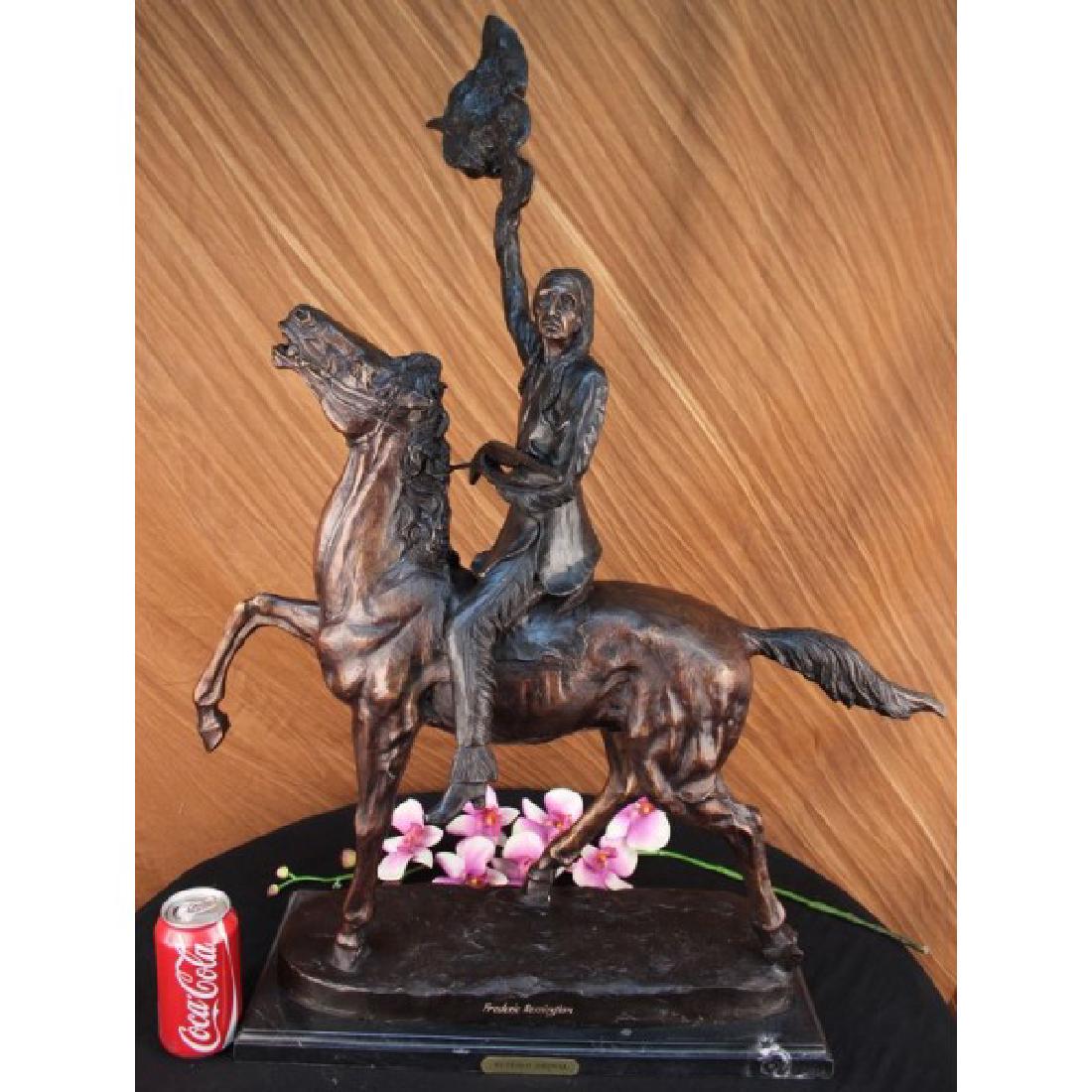 Signed Remington Buffalo Signal Native American on: One of Frederic Remington's rare bronze sculptures, "The Buffalo Signal" captures a Native American warrior sits triumphantly atop his horse. He holds his head high with defiance and triumph set in hi