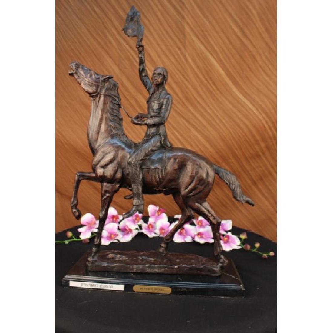 OLD WEST Indians WESTERN ART Bronze FREDERIC REMINGTON: One of Frederic Remington's rare bronze sculptures, "The Buffalo Signal" captures a Native American warrior sits triumphantly atop his horse. He holds his head high with defiance and triumph set in hi