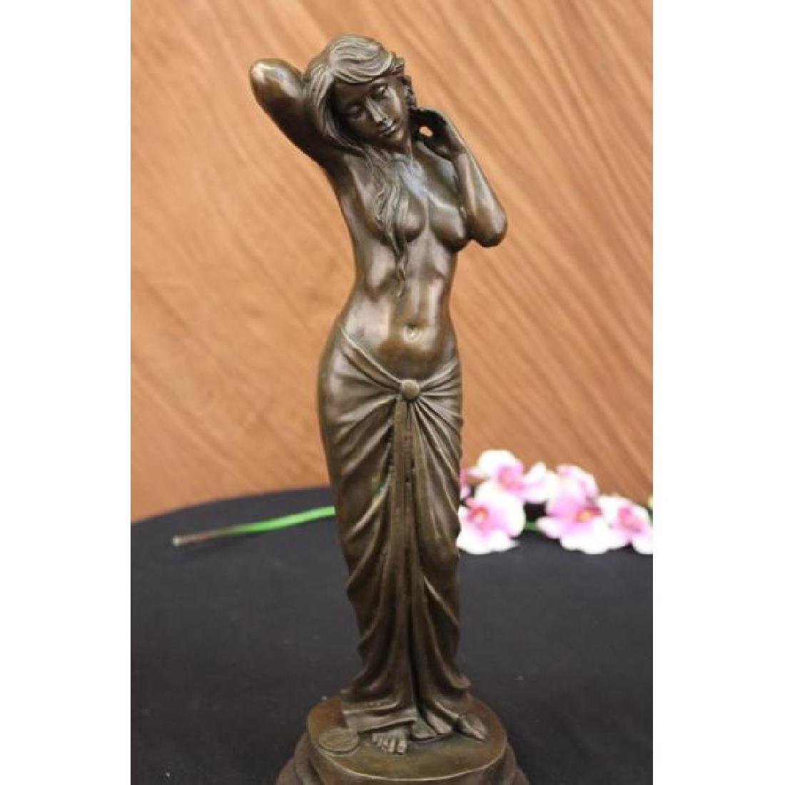 Hand Crafted Vitaleh Nude Nymph Bronze Sculpture Hot: Aldo Vitaleh has capture the essence of femininity in this piece. The woman stands with hands caressing her neck and hair. She is half-nude with a cloth skirt hugging her hips and curves. Her breasts