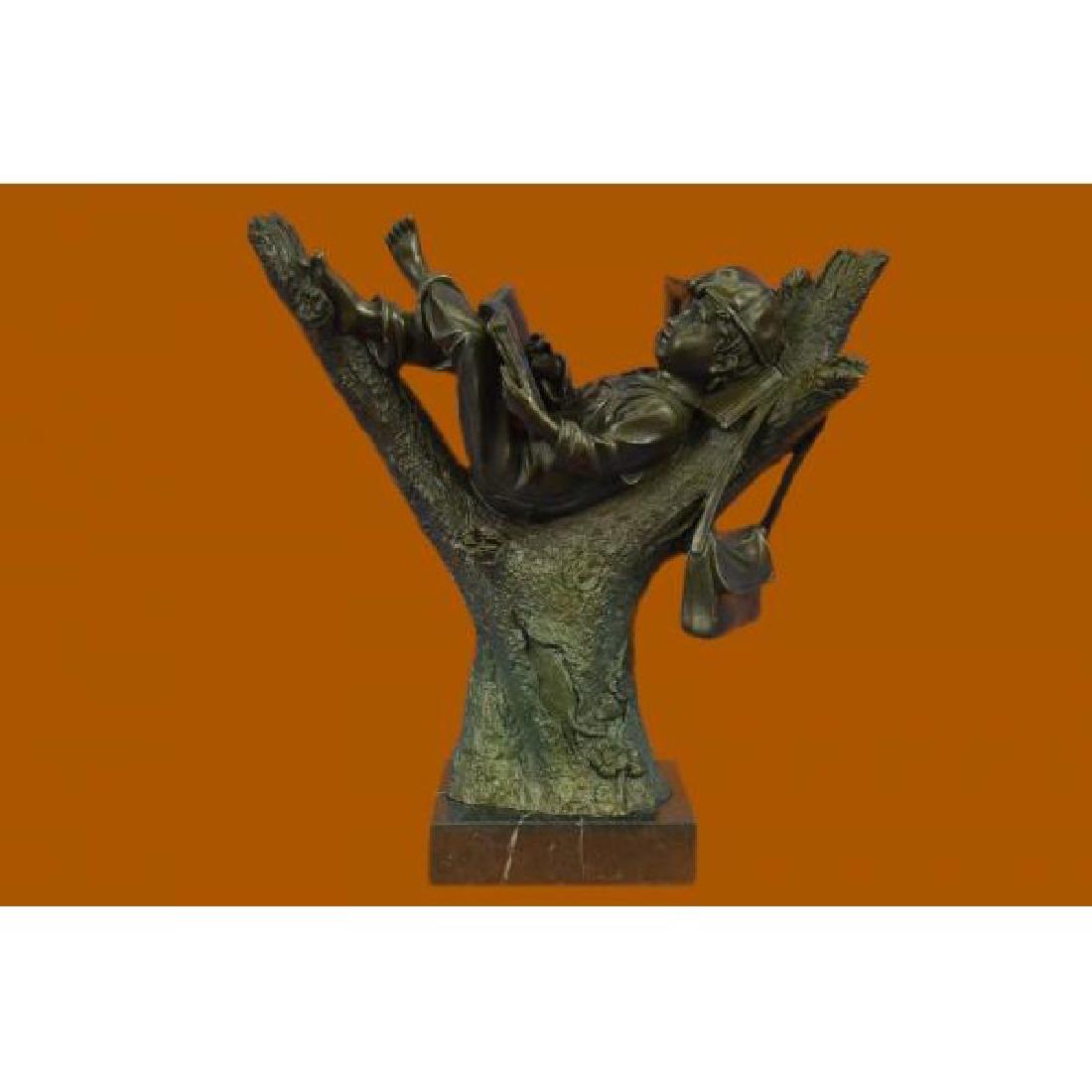 Home Decoration by Art Taylor Boy Reading On Top Of: Boy Reading On Top Of TreeThis bronze statue measures 12 high by 12 long. It is handmade and cast in the traditional Lost Wax Casting Process and is signed by artist Art Taylor. This insures a quality