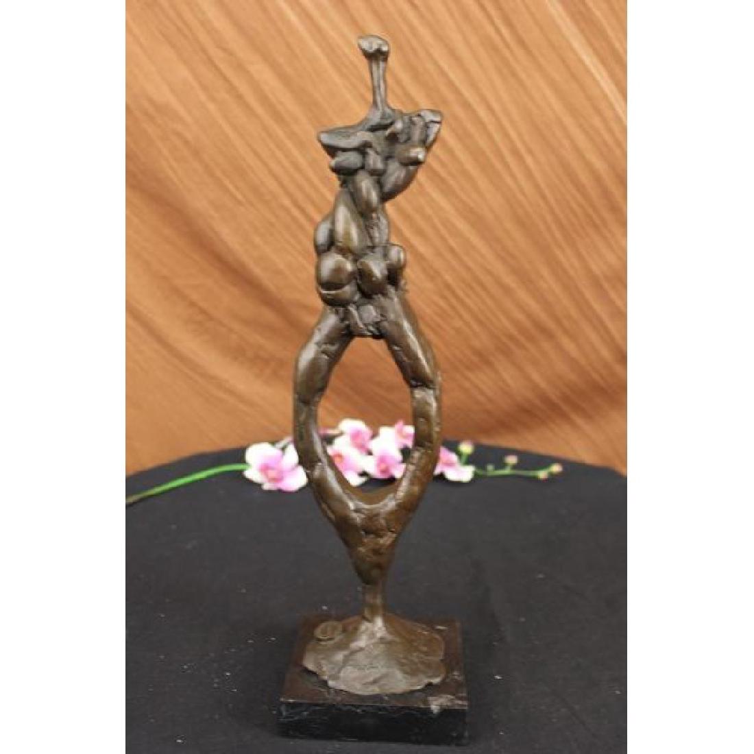 GIA CHIPARUS SOLID BRONZE SCULPTURE. ABSTRACT ART DECO: This is a very unique abstract of a man standing up. He appears to have all his organs out but its just the way the artist created this sculpture weirdly and different. He has a very tiny head and ext