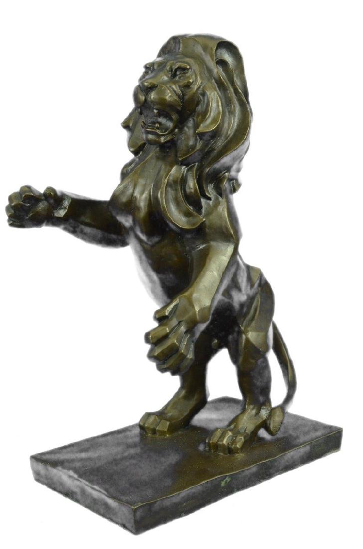 African Lion Wildlife Edition Bronze Sculpture: Though the most feared and lethal predator of the jungle, the beauty of a lion is undeniable. This 100% carefully handmade and fully detailed sculpture includes the smallest details of the king of all
