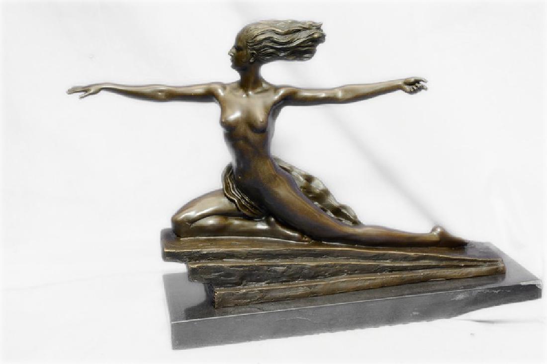 Nude Amazon Girl Bronze Statue: A colored cement low relief, for a fountain at the Crafts center and an earthenware statue representing ceramics for the Sevres Pavilion. French Art Deco Patinated Bronze Female Amazon Sculpture The s
