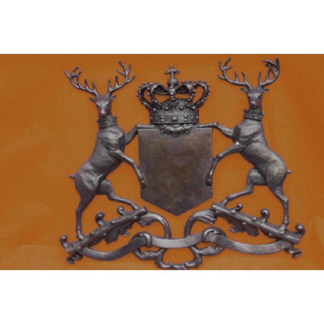 Handcrafted Detailed Family Crest Classic Bronze: This amazing piece that would go lovely as a family traditional crest describes the power behinda shield and two stags, they were use as a wayof protectionfrom all weapons, enemies, evil. This sculptu