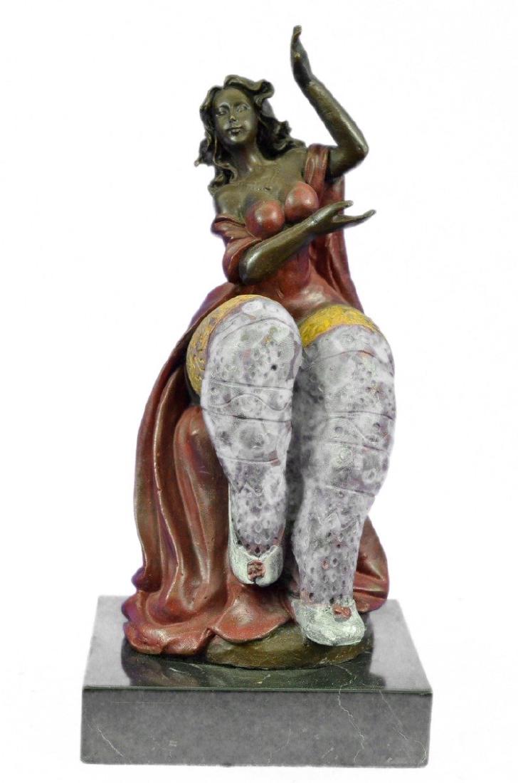 Curvaceous Lady Bronze Sculpture: This handmade Bronze Sculpture was cast using the archaic method of lost wax casting and stained with a brown patina finish for perpetuation it is mounted upon a marble base. Bronze Dimensions with Ma